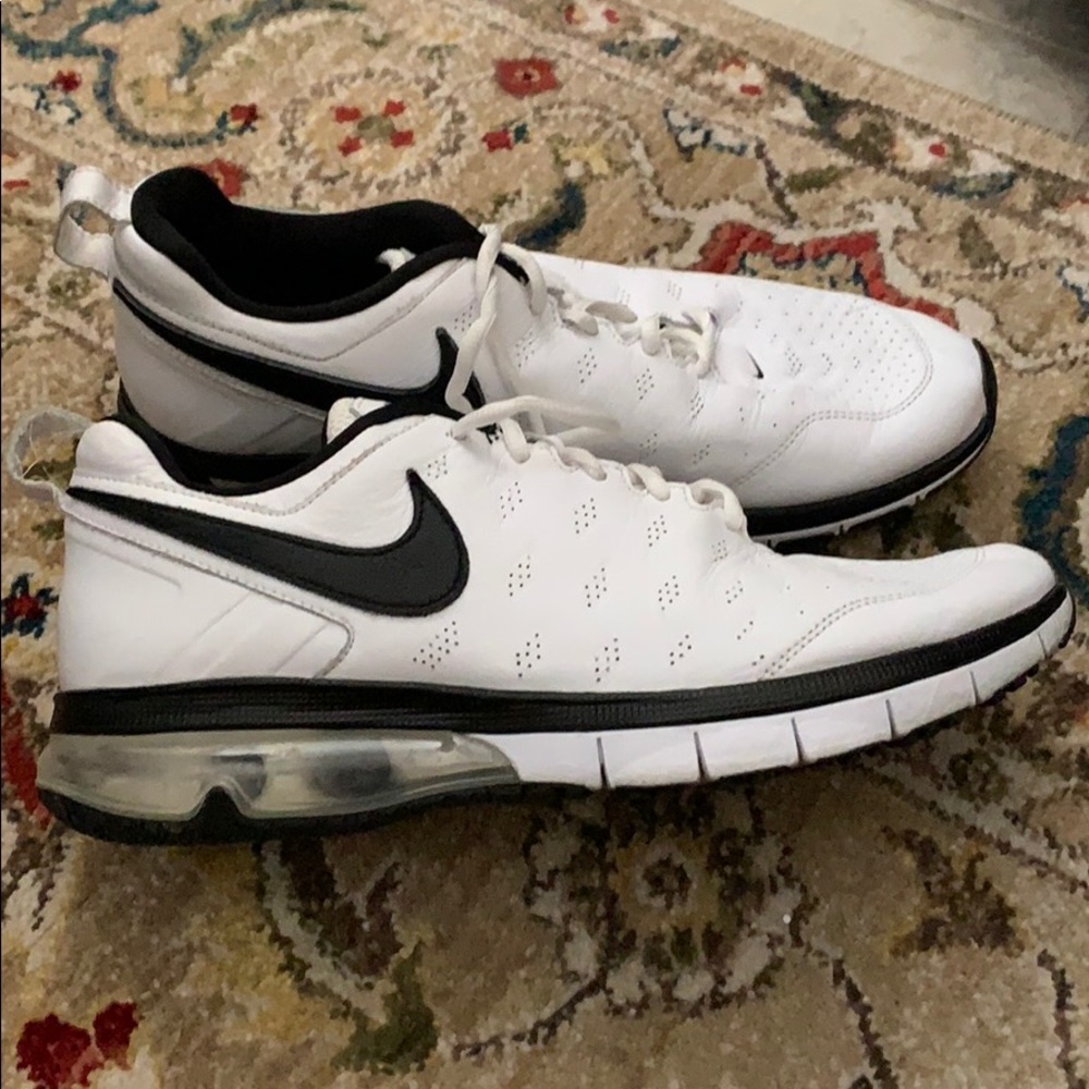 White and black Nike training shoes